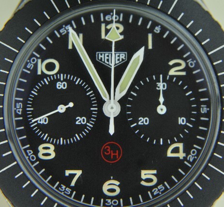 Closeup image of a vintage Heuer dial 